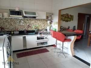 integrada à copa e cozinha com despensa