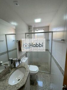banho da suíte com bancada em granito