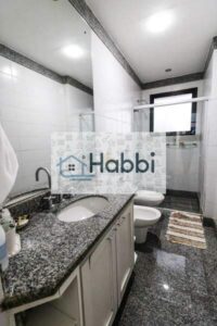 banho social com bancada em granito